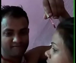 indian couple piecing..